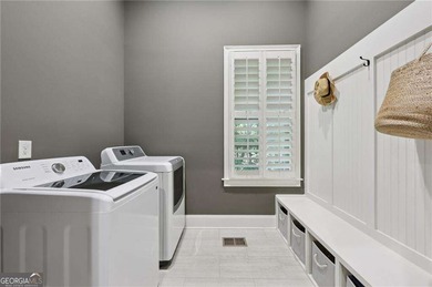 An architectural masterpiece in a gated community, on the 5th on Echelon Golf Club in Georgia - for sale on GolfHomes.com, golf home, golf lot