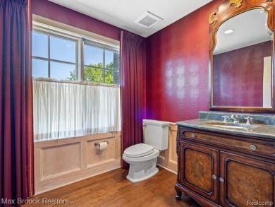 This exquisite French Country-inspired residence is situated on Forest Lake Country Club in Michigan - for sale on GolfHomes.com, golf home, golf lot