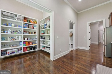 An architectural masterpiece in a gated community, on the 5th on Echelon Golf Club in Georgia - for sale on GolfHomes.com, golf home, golf lot