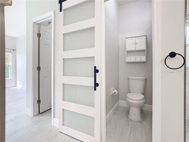 One or more photo(s) has been virtually staged. One or more on Stonegate Golf Club in Florida - for sale on GolfHomes.com, golf home, golf lot