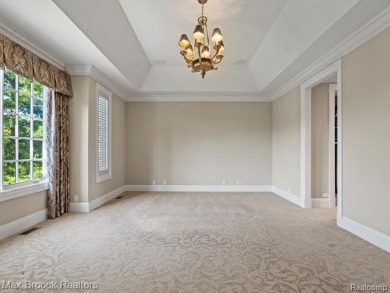 This exquisite French Country-inspired residence is situated on Forest Lake Country Club in Michigan - for sale on GolfHomes.com, golf home, golf lot