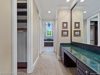 This exquisite French Country-inspired residence is situated on Forest Lake Country Club in Michigan - for sale on GolfHomes.com, golf home, golf lot