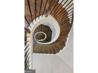 An architectural masterpiece in a gated community, on the 5th on Echelon Golf Club in Georgia - for sale on GolfHomes.com, golf home, golf lot