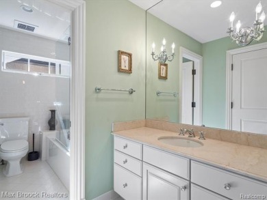 This exquisite French Country-inspired residence is situated on Forest Lake Country Club in Michigan - for sale on GolfHomes.com, golf home, golf lot