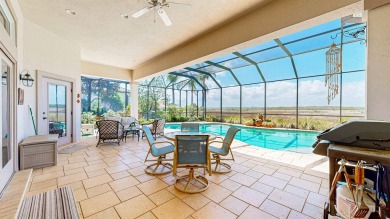 Discover The Perfect Blend Of Luxury  Comfort In This Stunning on Marsh Creek Country Club in Florida - for sale on GolfHomes.com, golf home, golf lot