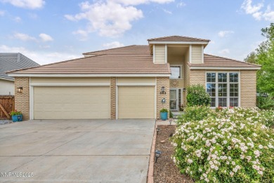 Stunning two-story home situated on the 15th green at Dayton on Dayton Valley Golf Club At Legado in Nevada - for sale on GolfHomes.com, golf home, golf lot