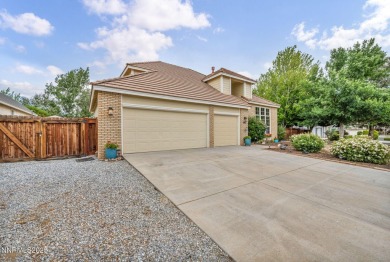 Stunning two-story home situated on the 15th green at Dayton on Dayton Valley Golf Club At Legado in Nevada - for sale on GolfHomes.com, golf home, golf lot