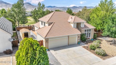 Stunning two-story home situated on the 15th green at Dayton on Dayton Valley Golf Club At Legado in Nevada - for sale on GolfHomes.com, golf home, golf lot