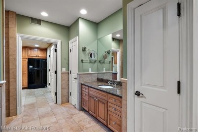 This exquisite French Country-inspired residence is situated on Forest Lake Country Club in Michigan - for sale on GolfHomes.com, golf home, golf lot