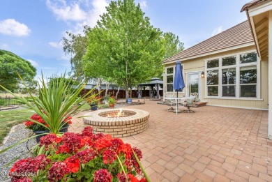 Stunning two-story home situated on the 15th green at Dayton on Dayton Valley Golf Club At Legado in Nevada - for sale on GolfHomes.com, golf home, golf lot