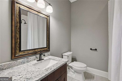 An architectural masterpiece in a gated community, on the 5th on Echelon Golf Club in Georgia - for sale on GolfHomes.com, golf home, golf lot