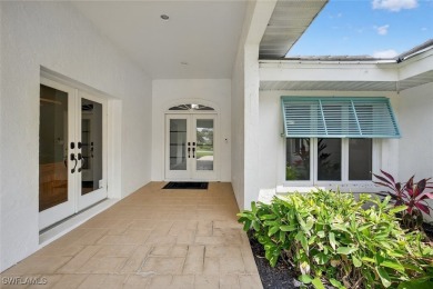 This stunning 3-bedroom, 3-bath residence den or bonus room on Fiddlesticks Country Club in Florida - for sale on GolfHomes.com, golf home, golf lot