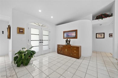 This stunning 3-bedroom, 3-bath residence den or bonus room on Fiddlesticks Country Club in Florida - for sale on GolfHomes.com, golf home, golf lot
