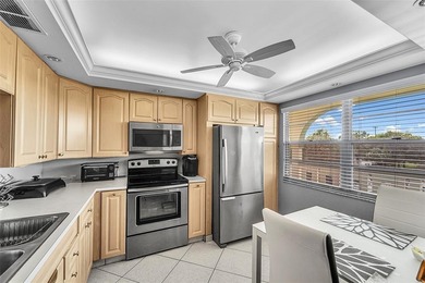 BEAUTIFUL 2 BEDROOM 2 BATH WITH MAGNIFICENT LAKE AND FOUNTAIN on Wynmoor Golf Course in Florida - for sale on GolfHomes.com, golf home, golf lot