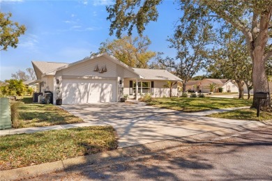 This Single Family home (55+ COMMUNITY) exudes top quality of on Highland Lakes Executive Golf Course in Florida - for sale on GolfHomes.com, golf home, golf lot