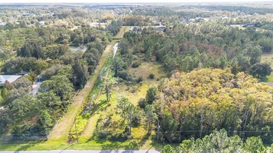Wedgefield Opportunity! Nearly 5 acres of land--cleared and on Wedgefield Golf Club in Florida - for sale on GolfHomes.com, golf home, golf lot