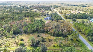 Wedgefield Opportunity! Nearly 5 acres of land--cleared and on Wedgefield Golf Club in Florida - for sale on GolfHomes.com, golf home, golf lot