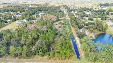 Wedgefield Opportunity! Nearly 5 acres of land--cleared and on Wedgefield Golf Club in Florida - for sale on GolfHomes.com, golf home, golf lot