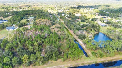 Wedgefield Opportunity! Nearly 5 acres of land--cleared and on Wedgefield Golf Club in Florida - for sale on GolfHomes.com, golf home, golf lot