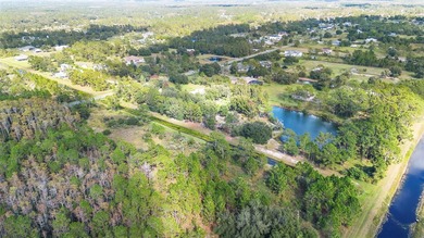 Wedgefield Opportunity! Nearly 5 acres of land--cleared and on Wedgefield Golf Club in Florida - for sale on GolfHomes.com, golf home, golf lot