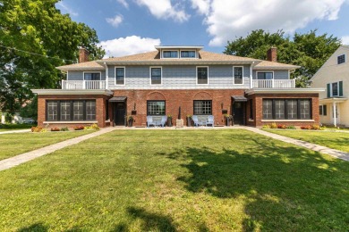 In 1922, two sisters made a thoughtful decision: life is better on Dubuque Golf and Country Club in Iowa - for sale on GolfHomes.com, golf home, golf lot