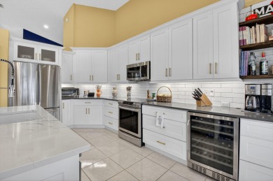 Located in the sought-after, gated community of The Glades at on Indian Spring Golf and Country Club in Florida - for sale on GolfHomes.com, golf home, golf lot