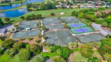 Located in the sought-after, gated community of The Glades at on Indian Spring Golf and Country Club in Florida - for sale on GolfHomes.com, golf home, golf lot