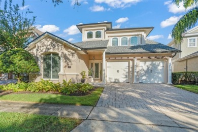 Captivating golf course views abound from this custom-built on Reunion Resort Golf Course in Florida - for sale on GolfHomes.com, golf home, golf lot