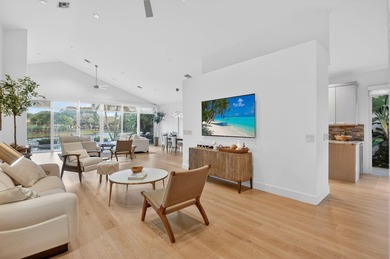 Discover refined single-story living in the prestigious Whisper on Broken Sound Golf and Club  in Florida - for sale on GolfHomes.com, golf home, golf lot