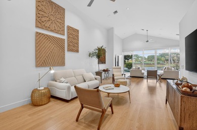 Discover refined single-story living in the prestigious Whisper on Broken Sound Golf and Club  in Florida - for sale on GolfHomes.com, golf home, golf lot