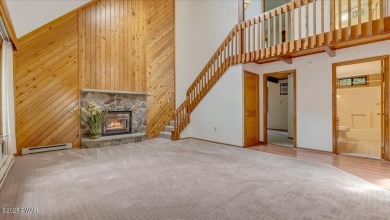 Nestled in the desirable Tanglwood Lakes community, this on Paupack Hills Golf and Country Club in Pennsylvania - for sale on GolfHomes.com, golf home, golf lot
