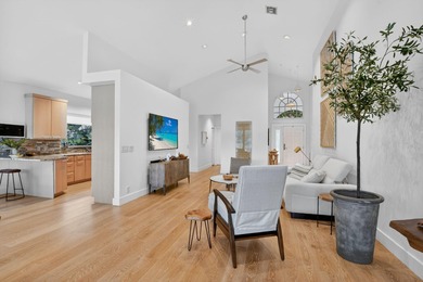 Discover refined single-story living in the prestigious Whisper on Broken Sound Golf and Club  in Florida - for sale on GolfHomes.com, golf home, golf lot