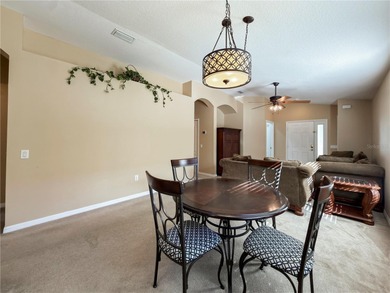 Welcome to this beautifully maintained 3-bedroom, 2-bathroom on Heritage Isles Golf and Country Club in Florida - for sale on GolfHomes.com, golf home, golf lot