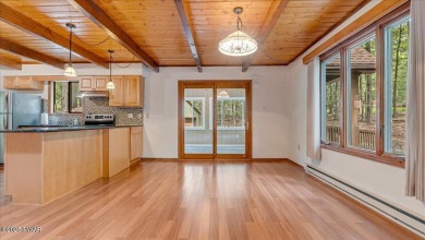 Nestled in the desirable Tanglwood Lakes community, this on Paupack Hills Golf and Country Club in Pennsylvania - for sale on GolfHomes.com, golf home, golf lot