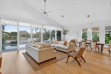 Discover refined single-story living in the prestigious Whisper on Broken Sound Golf and Club  in Florida - for sale on GolfHomes.com, golf home, golf lot