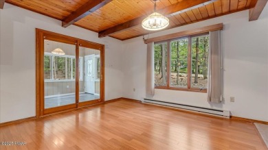 Nestled in the desirable Tanglwood Lakes community, this on Paupack Hills Golf and Country Club in Pennsylvania - for sale on GolfHomes.com, golf home, golf lot