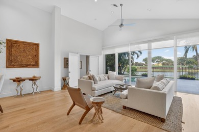 Discover refined single-story living in the prestigious Whisper on Broken Sound Golf and Club  in Florida - for sale on GolfHomes.com, golf home, golf lot