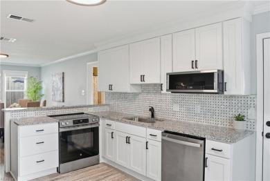 This like new open-concept floor plan is a beautifully renovated on Stumpy Lake Golf Course in Virginia - for sale on GolfHomes.com, golf home, golf lot