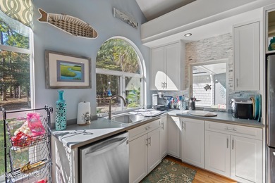 Welcome to this beautiful 3-bedroom, 2 1/2 bath home perfectly on Lockwood Folly Country Club in North Carolina - for sale on GolfHomes.com, golf home, golf lot