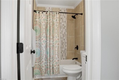 This like new open-concept floor plan is a beautifully renovated on Stumpy Lake Golf Course in Virginia - for sale on GolfHomes.com, golf home, golf lot