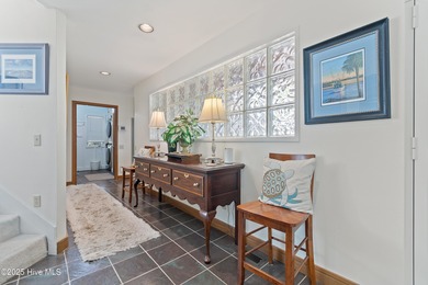 Welcome to this beautiful 3-bedroom, 2 1/2 bath home perfectly on Lockwood Folly Country Club in North Carolina - for sale on GolfHomes.com, golf home, golf lot