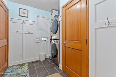 Welcome to this beautiful 3-bedroom, 2 1/2 bath home perfectly on Lockwood Folly Country Club in North Carolina - for sale on GolfHomes.com, golf home, golf lot