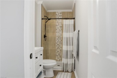 This like new open-concept floor plan is a beautifully renovated on Stumpy Lake Golf Course in Virginia - for sale on GolfHomes.com, golf home, golf lot