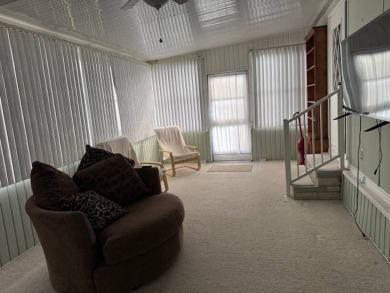 Discover Your Florida Oasis!    Welcome to your secret hideaway on Hamptons Golf Club in Florida - for sale on GolfHomes.com, golf home, golf lot