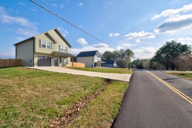 WELCOME TO 135 TREWHITT DRIVE. This three bedroom, 2 1/2 bath on Waterville Golf Course in Tennessee - for sale on GolfHomes.com, golf home, golf lot