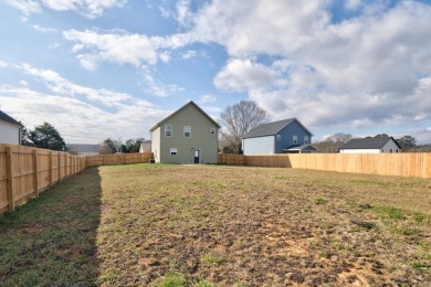 WELCOME TO 135 TREWHITT DRIVE. This three bedroom, 2 1/2 bath on Waterville Golf Course in Tennessee - for sale on GolfHomes.com, golf home, golf lot