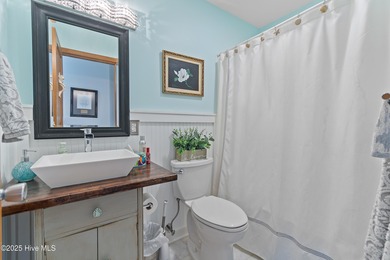 Welcome to this beautiful 3-bedroom, 2 1/2 bath home perfectly on Lockwood Folly Country Club in North Carolina - for sale on GolfHomes.com, golf home, golf lot