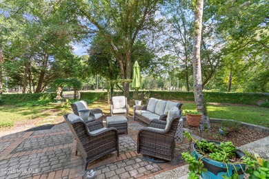 Welcome to this beautiful 3-bedroom, 2 1/2 bath home perfectly on Lockwood Folly Country Club in North Carolina - for sale on GolfHomes.com, golf home, golf lot