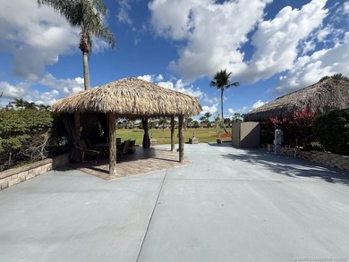 Prime Lakefront Lot on *Millionaire's Row* - Fully Furnished! on Motorcoach Resort Golf Course in Florida - for sale on GolfHomes.com, golf home, golf lot