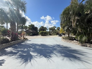Prime Lakefront Lot on *Millionaire's Row* - Fully Furnished! on Motorcoach Resort Golf Course in Florida - for sale on GolfHomes.com, golf home, golf lot